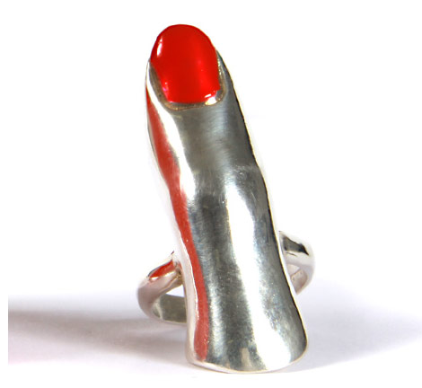 red nail polishes. silver ring red nail