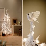 White Christmas tree dove atop Jeff Garofalo