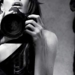 Angelina Jolie photographing herself in Marie Claire January 2012