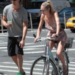 Candice Swanepoel rides bike with boyfriend