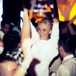 Caroline Trentini dancing at her wedding in white Theyskens leather dress