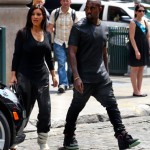 Kim Kardashian matching outfits with Kanye West wearing his shoes