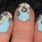 Colored flowers mint nail polish manicure