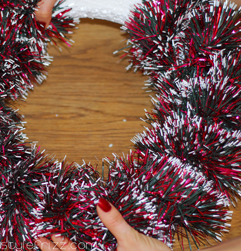 DIY wreaths finish wrapping garland