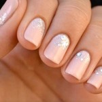 examples of nails with neutral polish and silver glitter