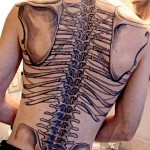 geek ink Astronomy inspired tattoo back bones