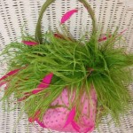 Green feathered pink bag