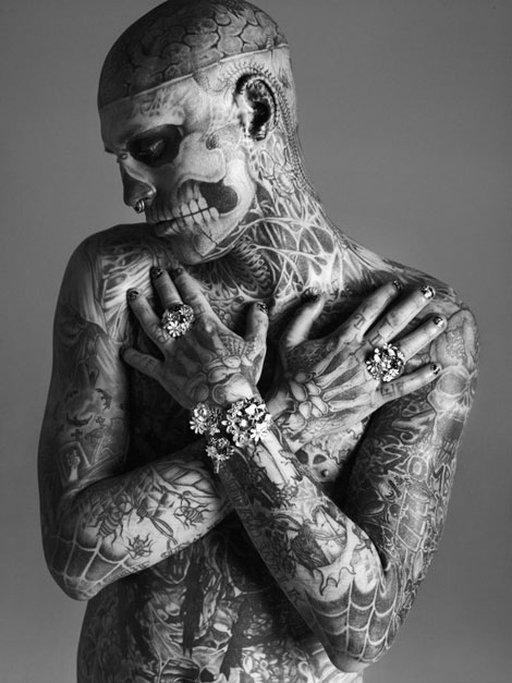 Heavy tattoos and jewelry