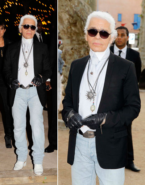 Karl Lagerfeld Wearing Whitewashed jeans and white boots