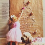 little girl decorating Christmas tree