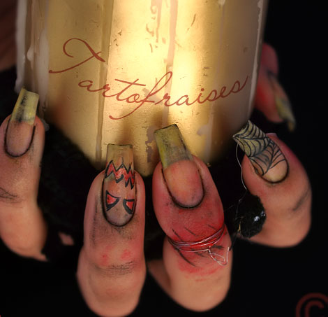 natural nails decorated with Halloween motifs