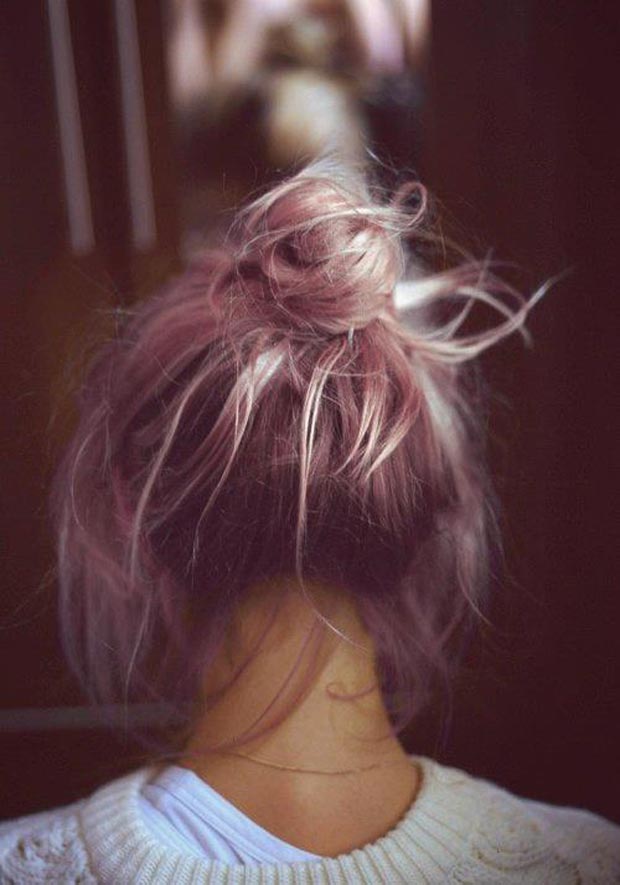 pink hair in a messy bun