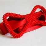 pretty red beaded bow tie by Innocent Creationz