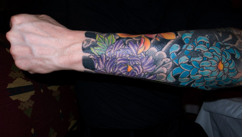 Stefano Pilati Floral arm tattoo large