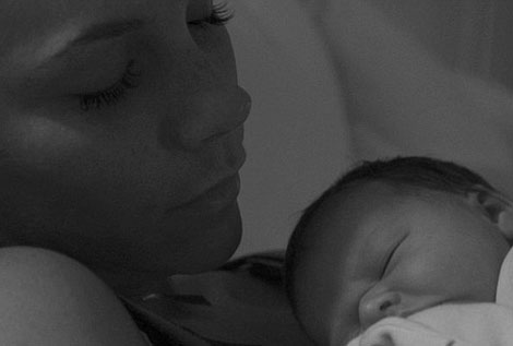 Victoria Beckham holding daughter Harper Seven Beckham