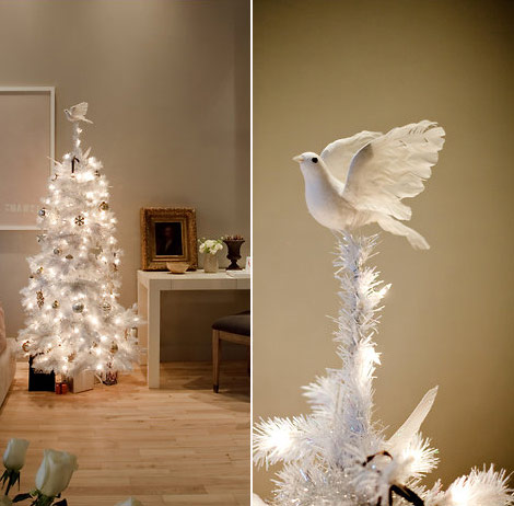 White Christmas tree dove atop Jeff Garofalo